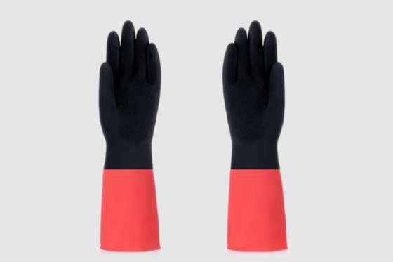 La résistance dissolvante de gant de ménage de latex de vaisselle s'est assemblée rayant le gant naturel de latex