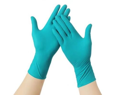 Gant de protection unique en nitrile jetable conçu pour répondre aux normes de sécurité des secteurs de la santé et de l'industrie.