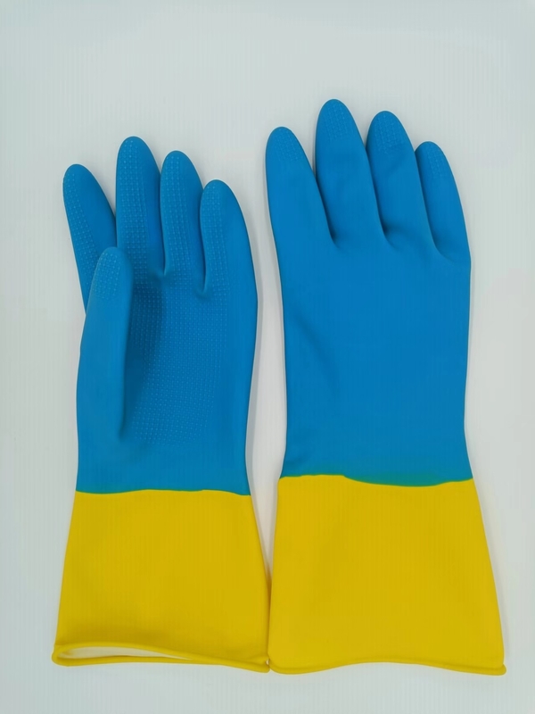 La maison bicolore industrielle de gant de latex jaune bleu s'est assemblée la résistance chimique